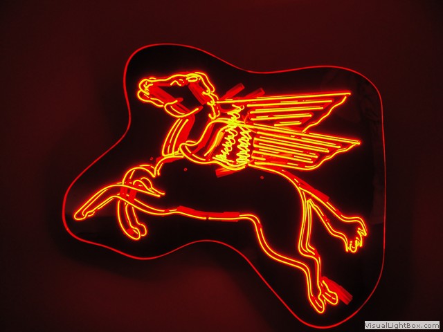 Neon Pegasus sign - red and orange neon glass art by Morry's Neon